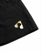 Court shorts til herre – svart og gull